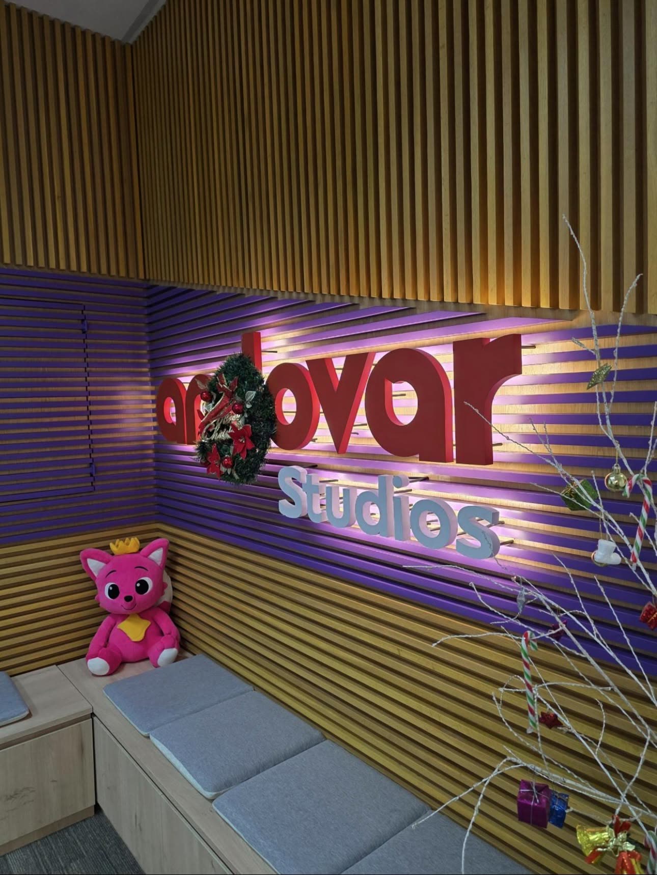Andovar Studios logo wall at the Bangkok office