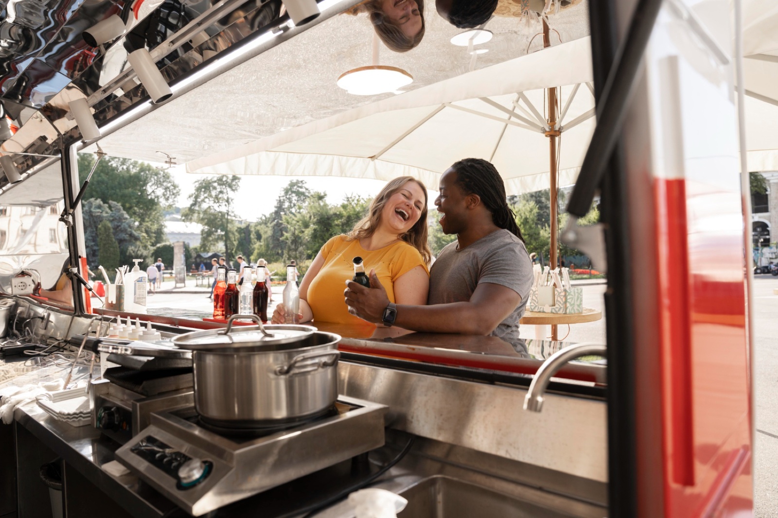 Customers being served at a Bistro Trailers food trailer counter