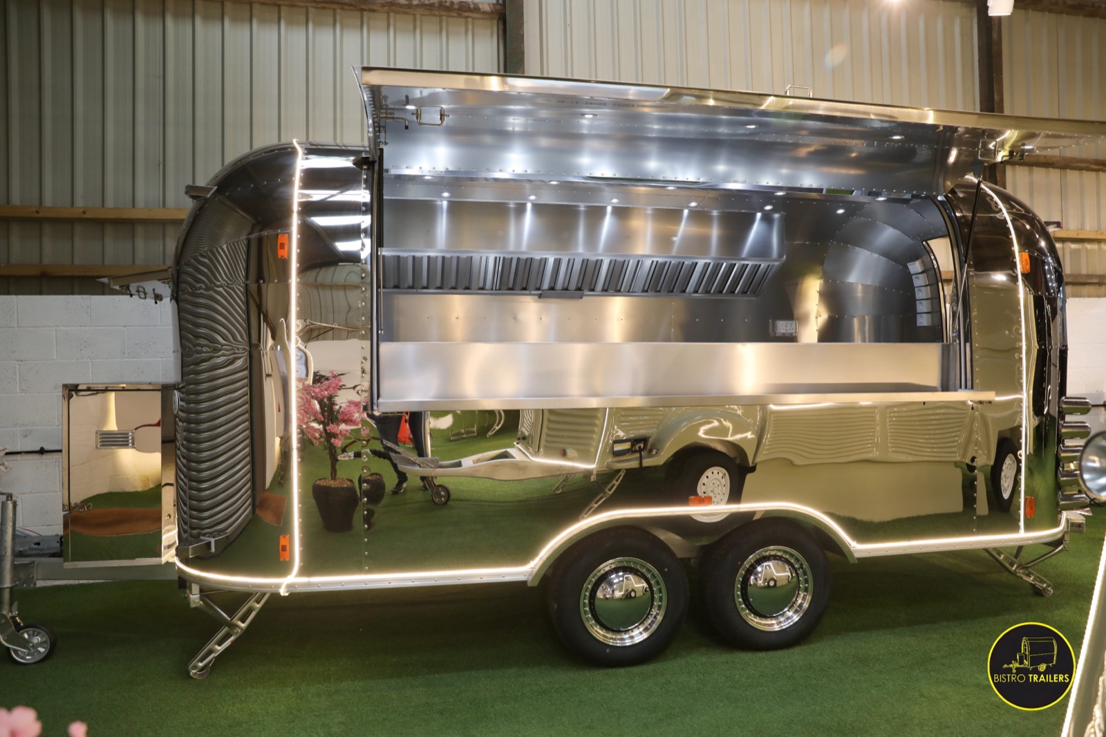 A polished stainless-steel Bistro catering trailer
