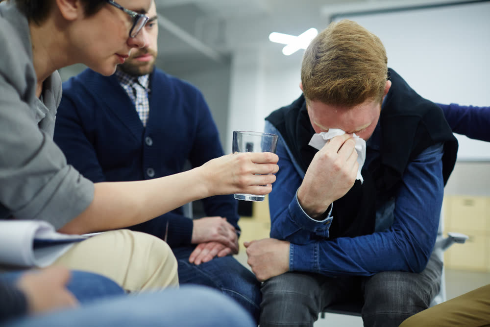 A moment of peer support and reassurance during therapy