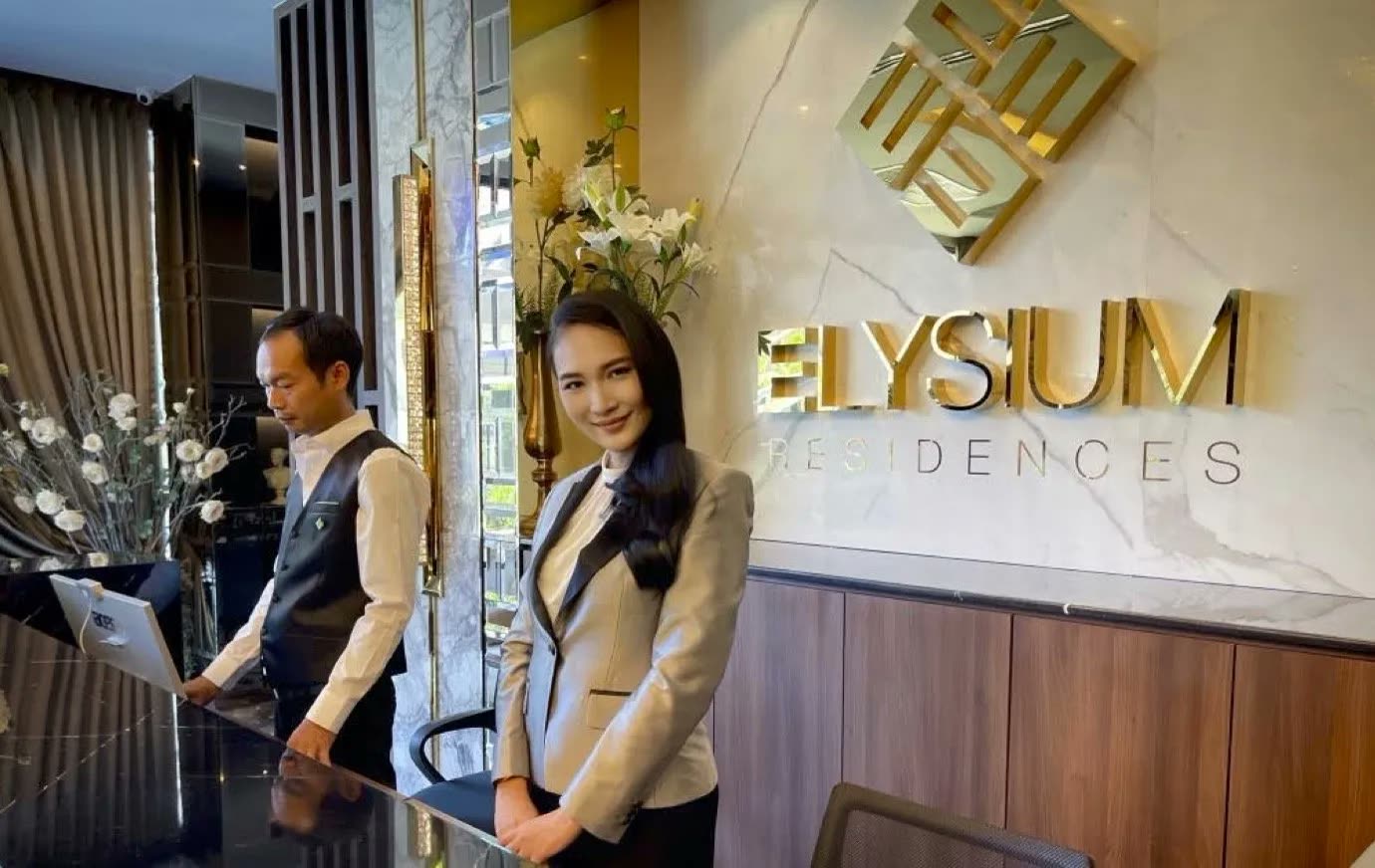 Reception team welcoming guests at Elysium Residences Pattaya