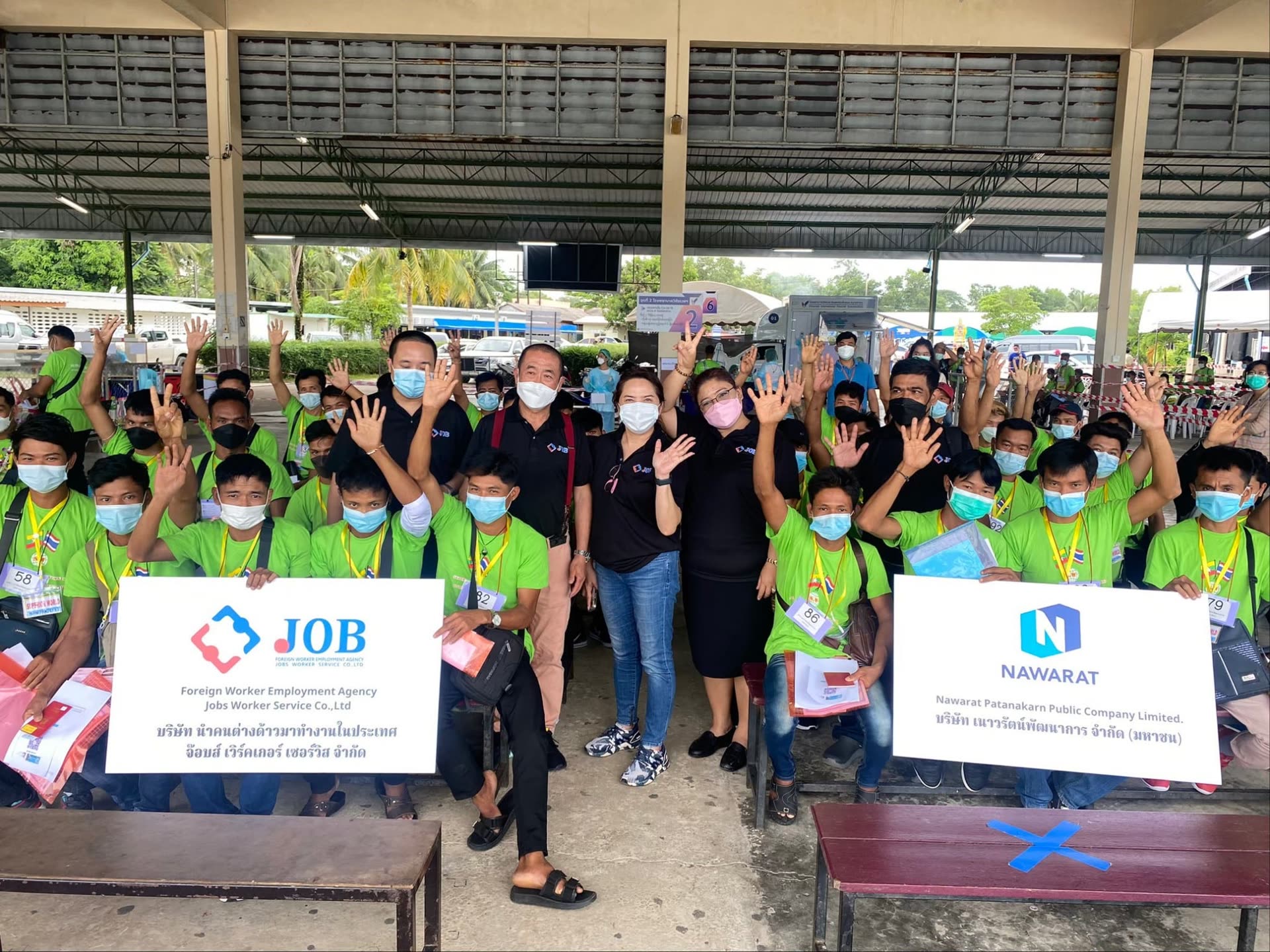 JOBS Worker Service team with MOU workers at a processing centre