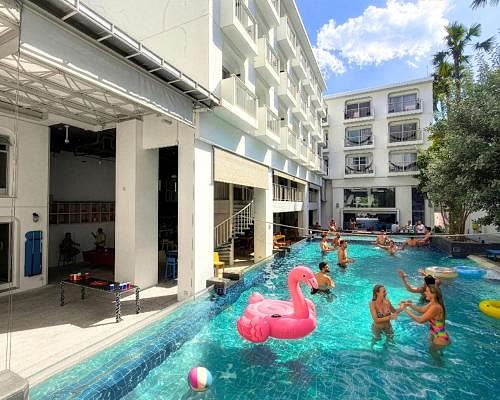 Guests enjoying the pool at Lub d Phuket Patong