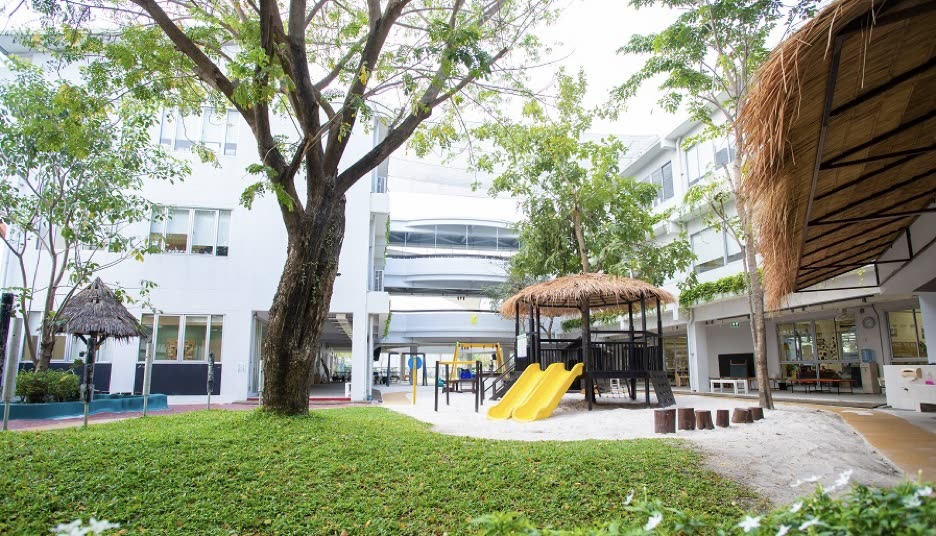 Playground and campus buildings at Magic Years International School