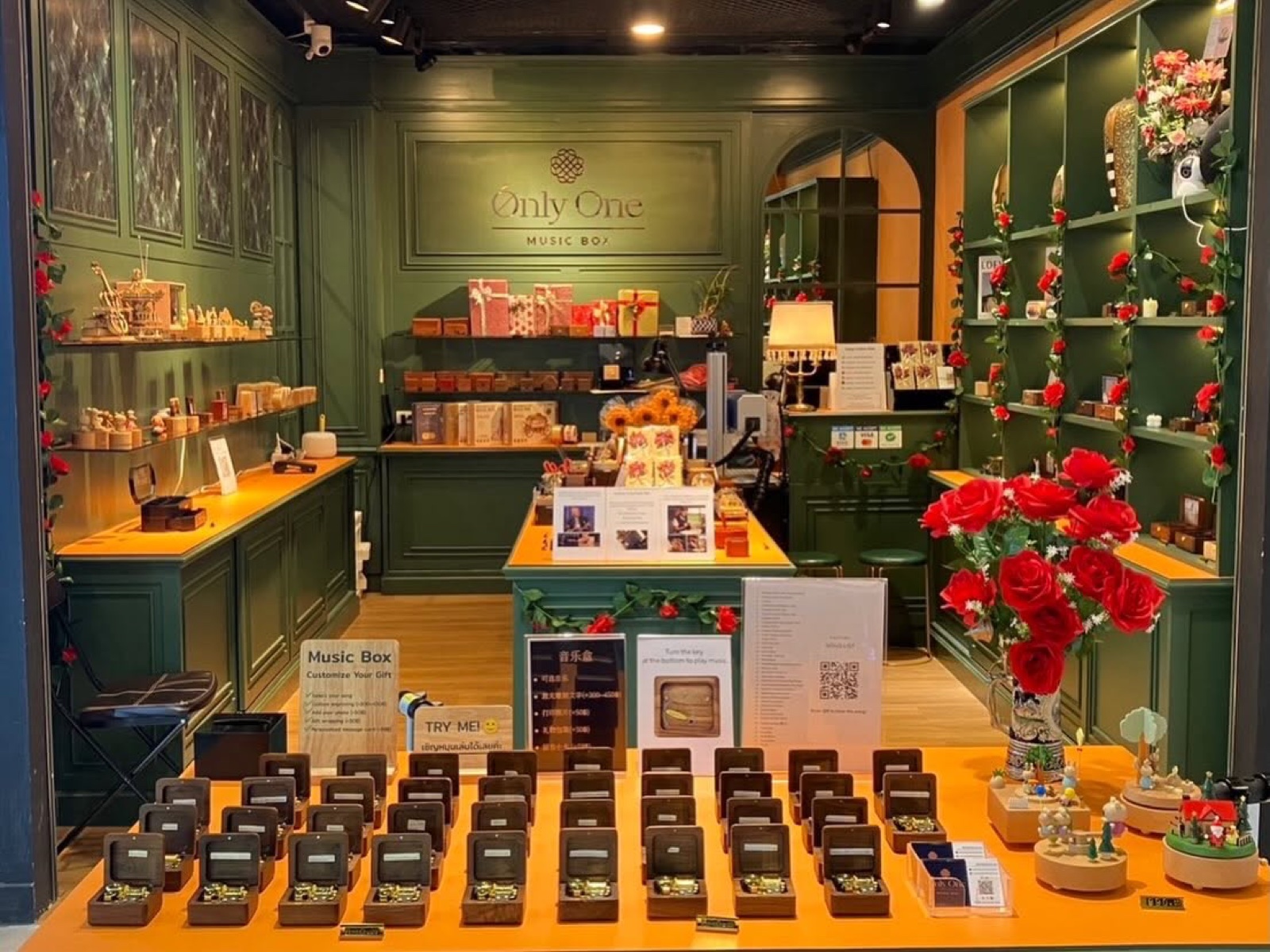 Interior of the Only One Music Box shop with wooden music boxes on display
