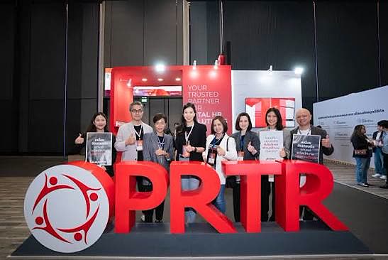 The PRTR team behind giant brand letters at a recruitment expo