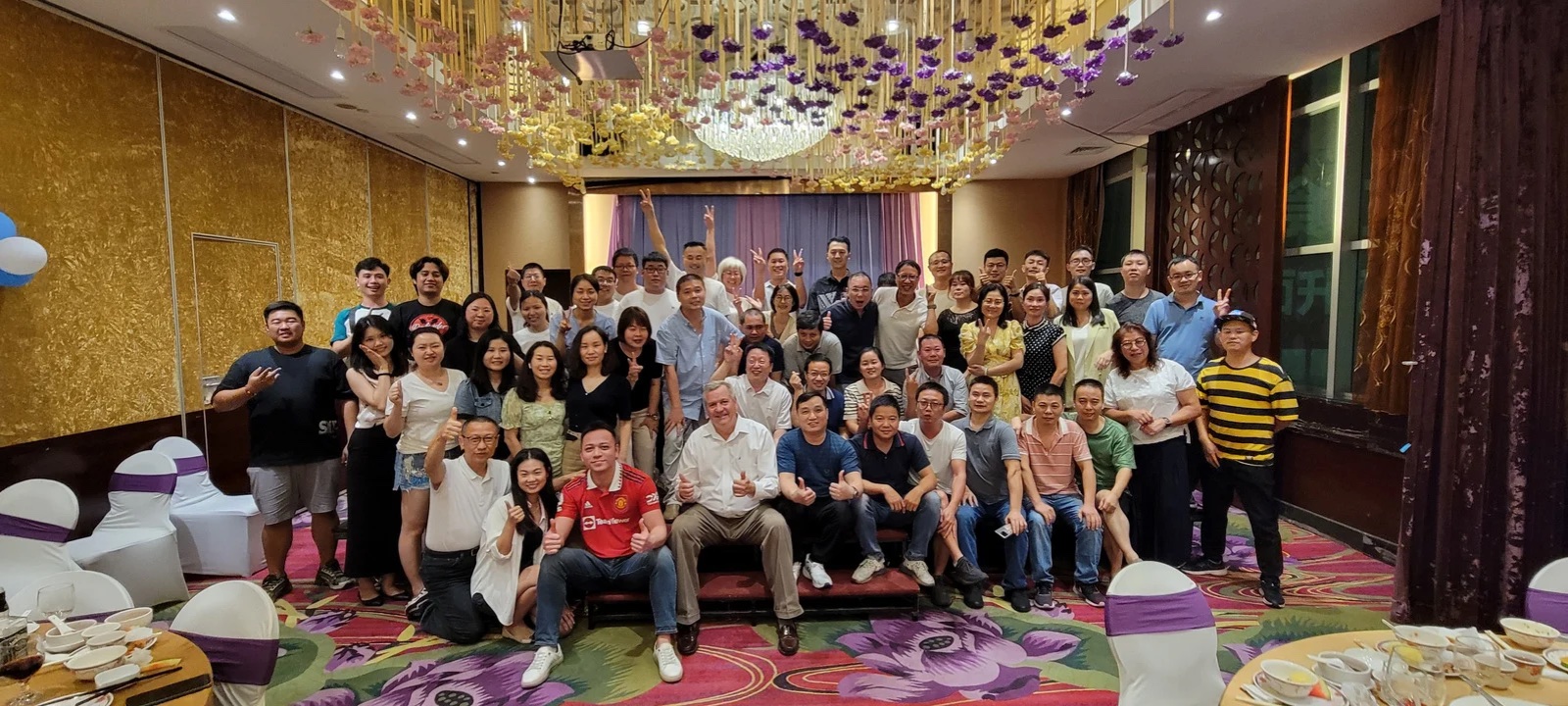 The Source One team at a company anniversary event