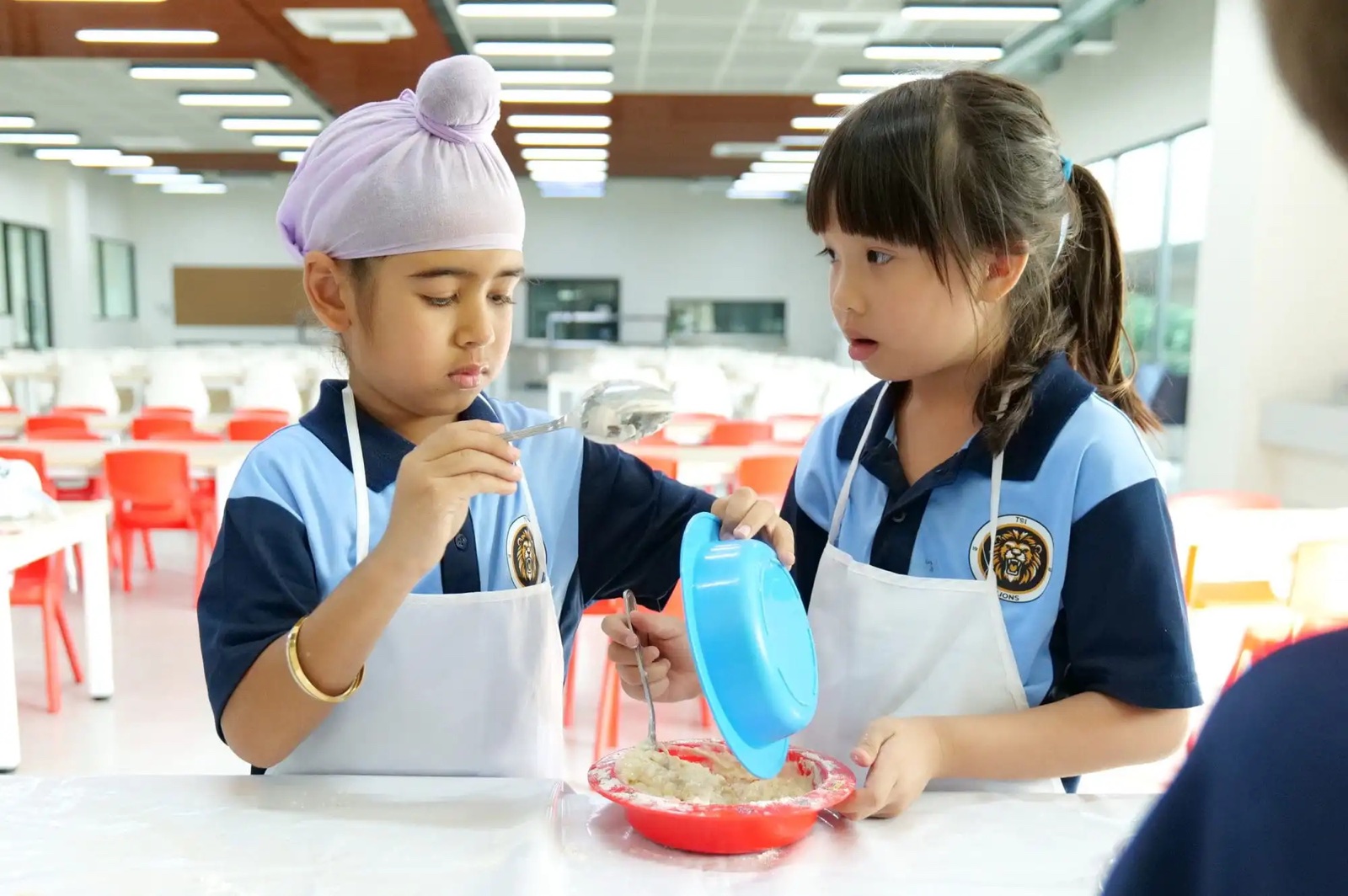 Students in the TSI International School dining hall
