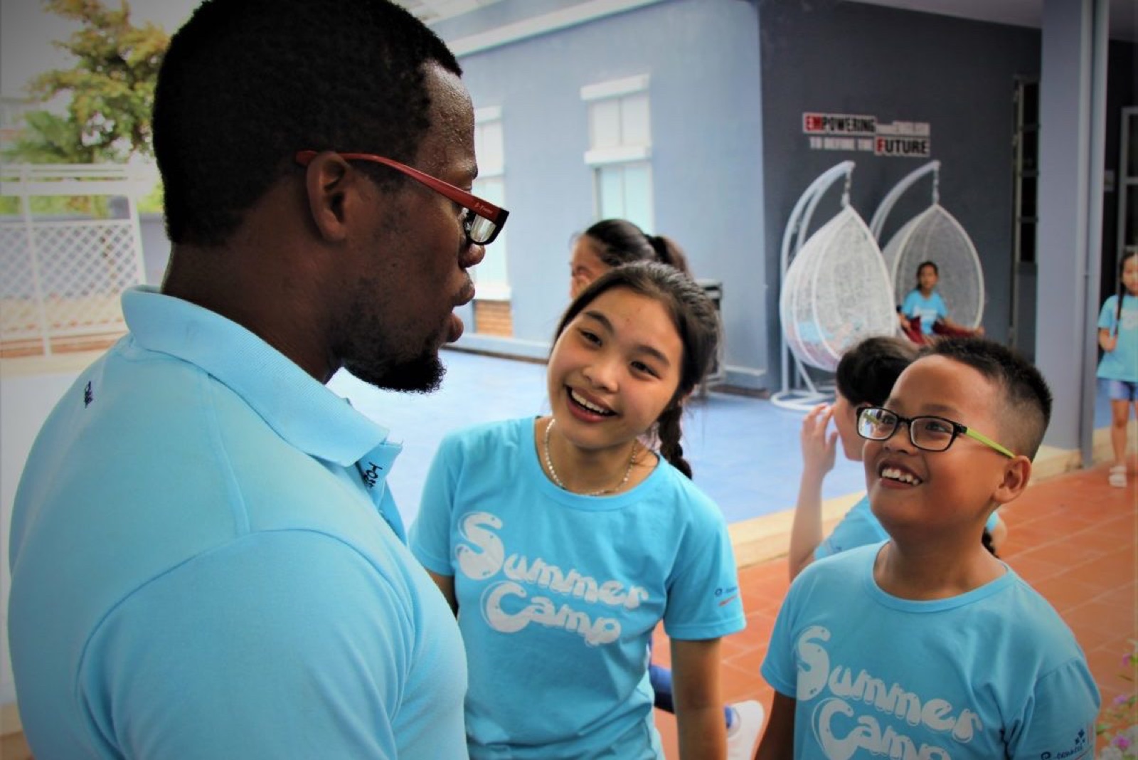 An Xplore Asia teacher with local students
